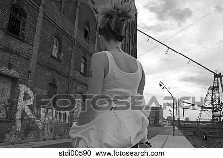 Stock Image - tattoo, bodybuilding, sport, strength training, woman, vamp, arms. Fotosearch