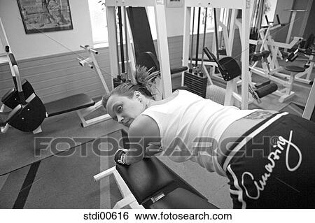 Stock Photograph - teddy, bodybuilding, woman, arms, strength training, build-up of muscles, portrait. Fotosearch