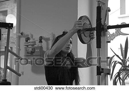 Stock Image - torso, bodybuilding, sport, woman, shop, upper part of the body, arms. Fotosearch