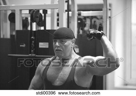 training, biceps, training tool, gold chain, bodybuilding, arms View Large Photo Image Stock Photograph - training, biceps, training tool, gold chain, bodybuilding, arms. Fotosearch