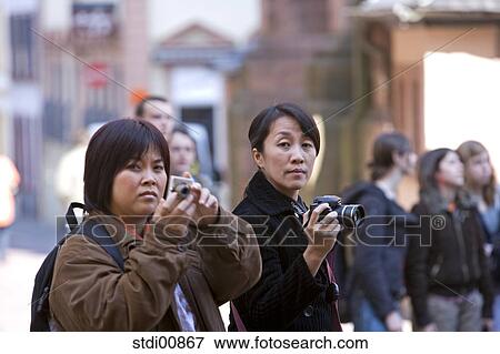 Stock Photo - travel, duct, tour group, tour guide, circular tour, sightseer, trip. Fotosearch