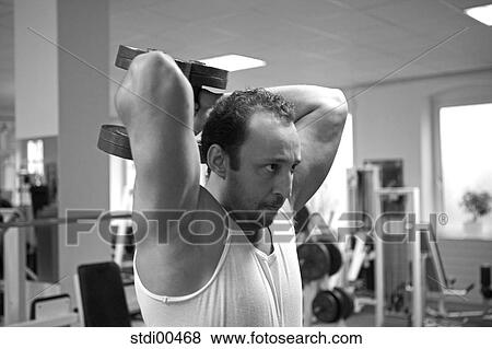 Stock Photo - upper part of the body, bodybuilding, torso, sport, shop, arms. Fotosearch