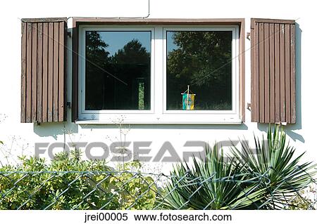 window, windows, front garden, bunting, house front, fence, garden View Large Photo Image Stock Photography - window, windows, front garden, bunting, house front, fence, garden. Fotosearch