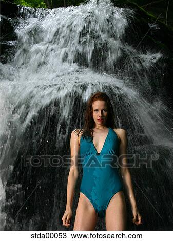 Stock Image - woman, brunette, full body, years old, model, downwards, close to nature. Fotosearch
