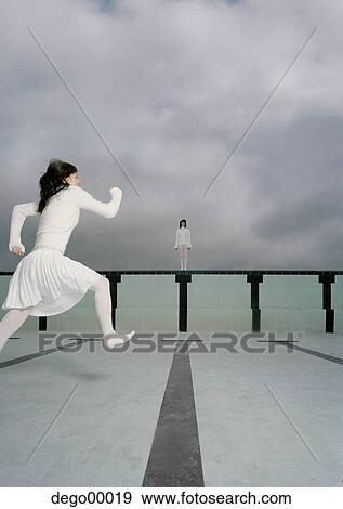 Stock Photo - woman, race, clothes, modern, fashion, dressed, legs. Fotosearch