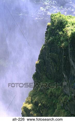 Cliff and Victoria Falls Zimbabwe View Large Photo Image Stock Photograph - Cliff and Victoria Falls Zimbabwe. Fotosearch