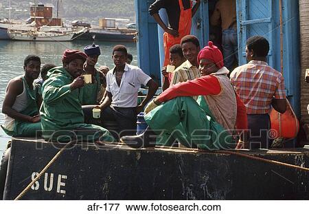 Stock Photo - Fishermen on Wharf Cape Peninsular South Africa. Fotosearch