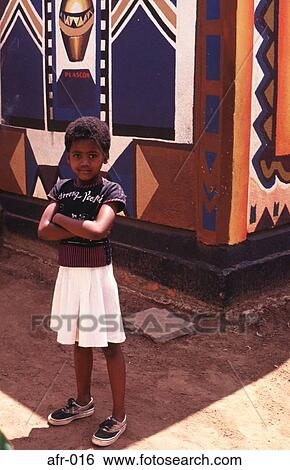 Girl with Arms Folded outside Ndebele House Africa View Large Photo Image Stock Photograph - Girl with Arms Folded outside Ndebele House Africa. Fotosearch