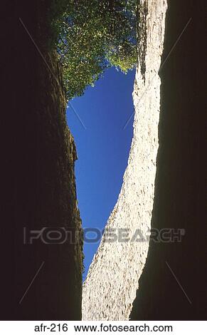 Stone Walls against Blue Sky Great Zimbabwe View Large Photo Image Stock Photograph - Stone Walls against Blue Sky Great Zimbabwe. Fotosearch