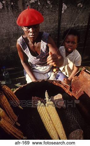 Woman Toasting Maize Soweto South Africa View Large Photo Image Stock Photo - Woman Toasting Maize Soweto South Africa. Fotosearch