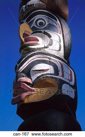 Birdlike beaked Face on Totem Pole Vancouver Canada View Large Photo Image Stock Photo - Birdlike beaked Face on Totem Pole Vancouver Canada. Fotosearch