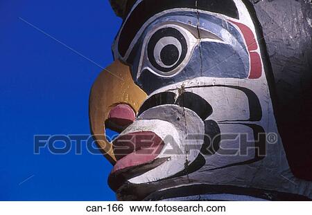 Birdlike beaked Face on Totem Pole Vancouver Canada View Large Photo Image Stock Photograph - Birdlike beaked Face on Totem Pole Vancouver Canada. Fotosearch