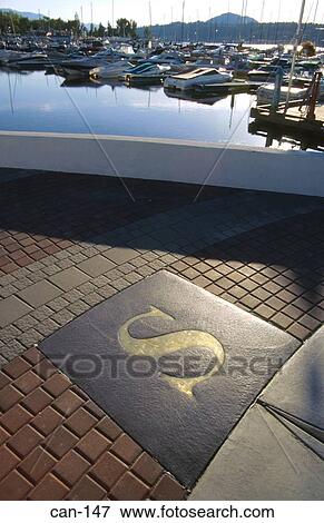 Compass Point on Pavement Kelowna Canada View Large Photo Image Stock Photo - Compass Point on Pavement Kelowna Canada. Fotosearch