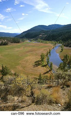 Stock Photograph - Hayes River Running Through Rural Valley Canada. Fotosearch
