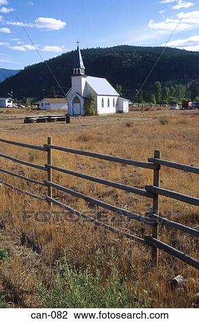 Stock Image - Old Wooden Church in Field Rural Canada. Fotosearch