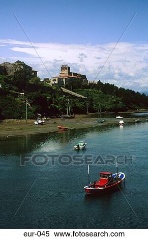 Stock Photography - Boat River Church St Vincent Spain. Fotosearch