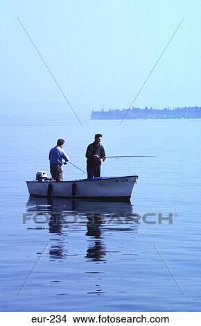 Picture - Men in Boat Fishing on Lake Geneva Switzerland. Fotosearch