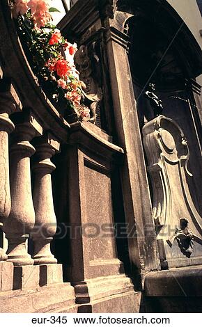 Stock Photography - Oblique View of Manekin Pis Statue Brussels Belgium. Fotosearch