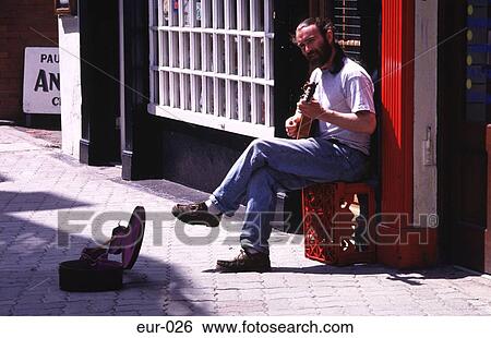 Street Musician Ireland View Large Photo Image Stock Photograph - Street Musician Ireland. Fotosearch