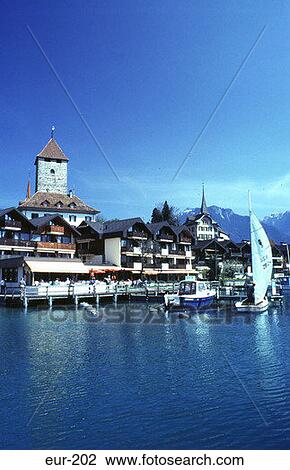 Stock Image - Yacht Moored Quay Spiez Switzerland. Fotosearch