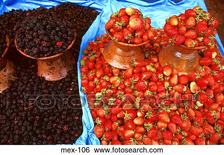 Stock Photograph - Blackberries and Strawberries on Market Stall Mexico. Fotosearch