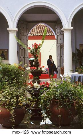 Stock Photograph - Colonnaded Walk by Garden Mexico City Mexico. Fotosearch