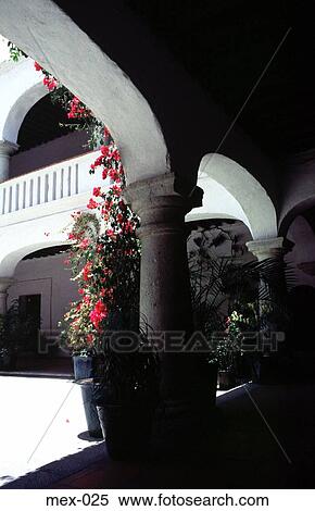 Flowers around Arch in Courtyard Mexico View Large Photo Image Stock Photography - Flowers around Arch in Courtyard Mexico. Fotosearch