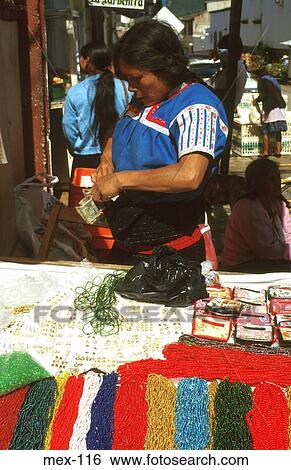 Indian Woman Serving at Market Stall Mexico View Large Photo Image Stock Photograph - Indian Woman Serving at Market Stall Mexico. Fotosearch