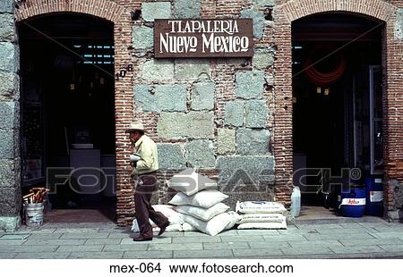 Man and Sacks outside Hardware Store Oaxaca Mexico View Large Photo Image Picture - Man and Sacks outside Hardware Store Oaxaca Mexico. Fotosearch