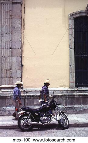 Stock Image - Men and a Motorbike Mexico. Fotosearch
