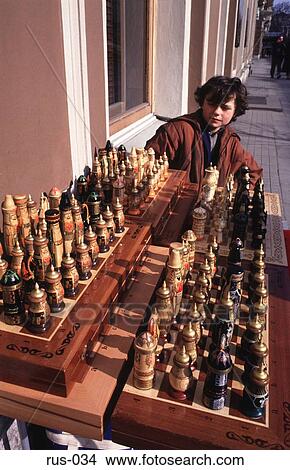 Picture - Street Trader Selling Chess Set St Petersburg. Fotosearch