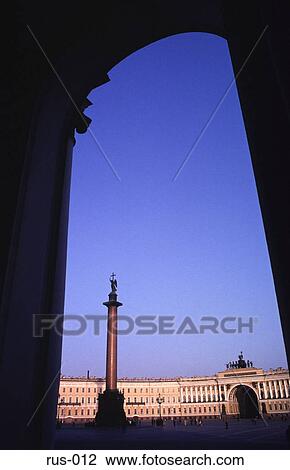 Stock Image - View through Arch to Alexander Column St Petersburg. Fotosearch