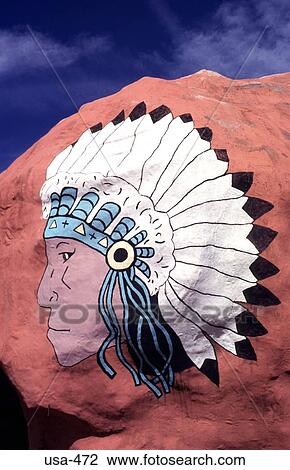 Stock Image - American Indian Chief's Head Pained on Rock Utah. Fotosearch