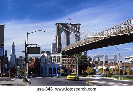 Stock Image - Brooklyn Bridge and Buildings New York City USA. Fotosearch