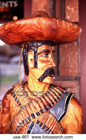 Stock Image - Carving of Cigar Smoking Mexican Sadona Arizona. Fotosearch