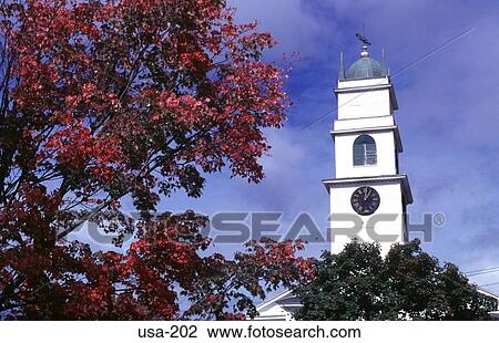 Stock Image - Church Tower Rising through Trees Lyme New Hampshire. Fotosearch