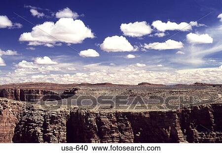 Stock Image - Clouds in the Arizona Desert. Fotosearch