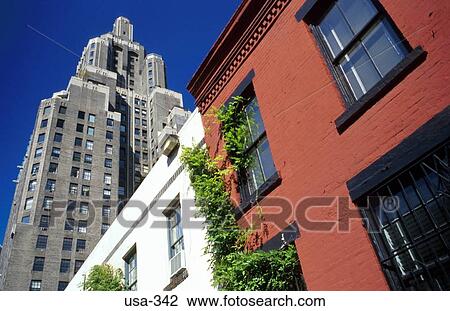 Stock Image - Colourful Terraced Houses Greenwich Village USA. Fotosearch