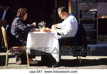 Couple Eating at Pavement Restaurant New York USA View Large Photo Image Stock Image - Couple Eating at Pavement Restaurant New York USA. Fotosearch