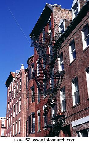 Stock Image - Fire Escape on Apartments Little Italy Boston USA. Fotosearch