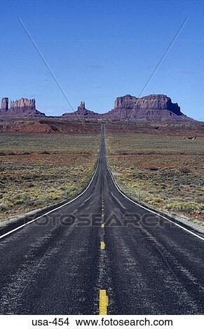 Picture - Highway into the Distance Monument Valley Arizona. Fotosearch