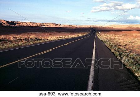 Stock Image - Highway Through Arizona Desert. Fotosearch