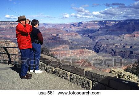 Man and Woman Viewing Grand Canyon Arizona View Large Photo Image Stock Image - Man and Woman Viewing Grand Canyon Arizona. Fotosearch