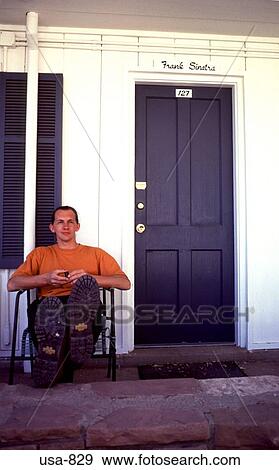 Stock Photo - Man on Veranda Kanab Utah. Fotosearch