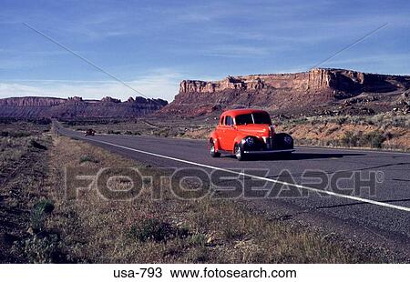 Old Red Car Driving on Utah Highway View Large Photo Image Stock Image - Old Red Car Driving on Utah Highway. Fotosearch