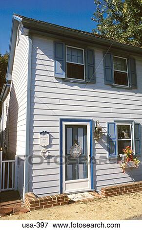 Stock Photo - Ornate Blue Timber Framed House Facade Maryland USA. Fotosearch