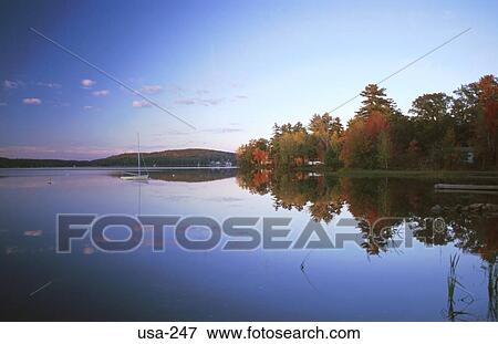 Reflection of bank in Lake at Evening USA View Large Photo Image Stock Photo - Reflection of bank in Lake at Evening USA. Fotosearch