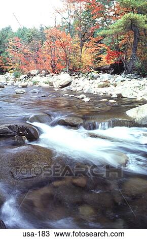 River Flowing over Rocks New Hampshire USA View Large Photo Image Stock Image - River Flowing over Rocks New Hampshire USA. Fotosearch