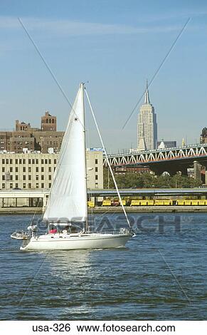 Sailing Yacht on East River New York City USA View Large Photo Image Stock Photograph - Sailing Yacht on East River New York City USA. Fotosearch