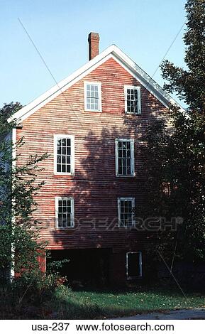 Stock Photo - Side of Red Timber House Wakefield New Hampshire. Fotosearch